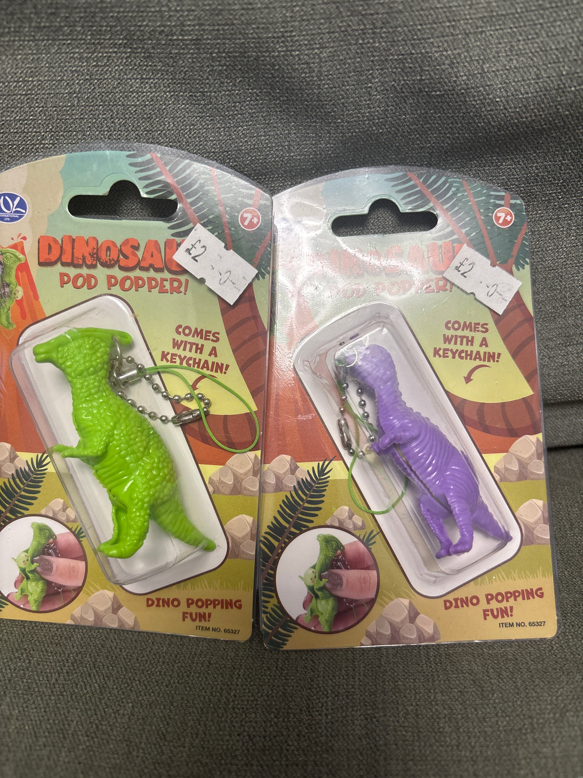 Dinosaur pea pod popper keychain