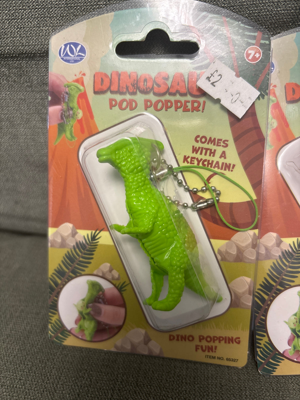 Dinosaur pea pod popper keychain